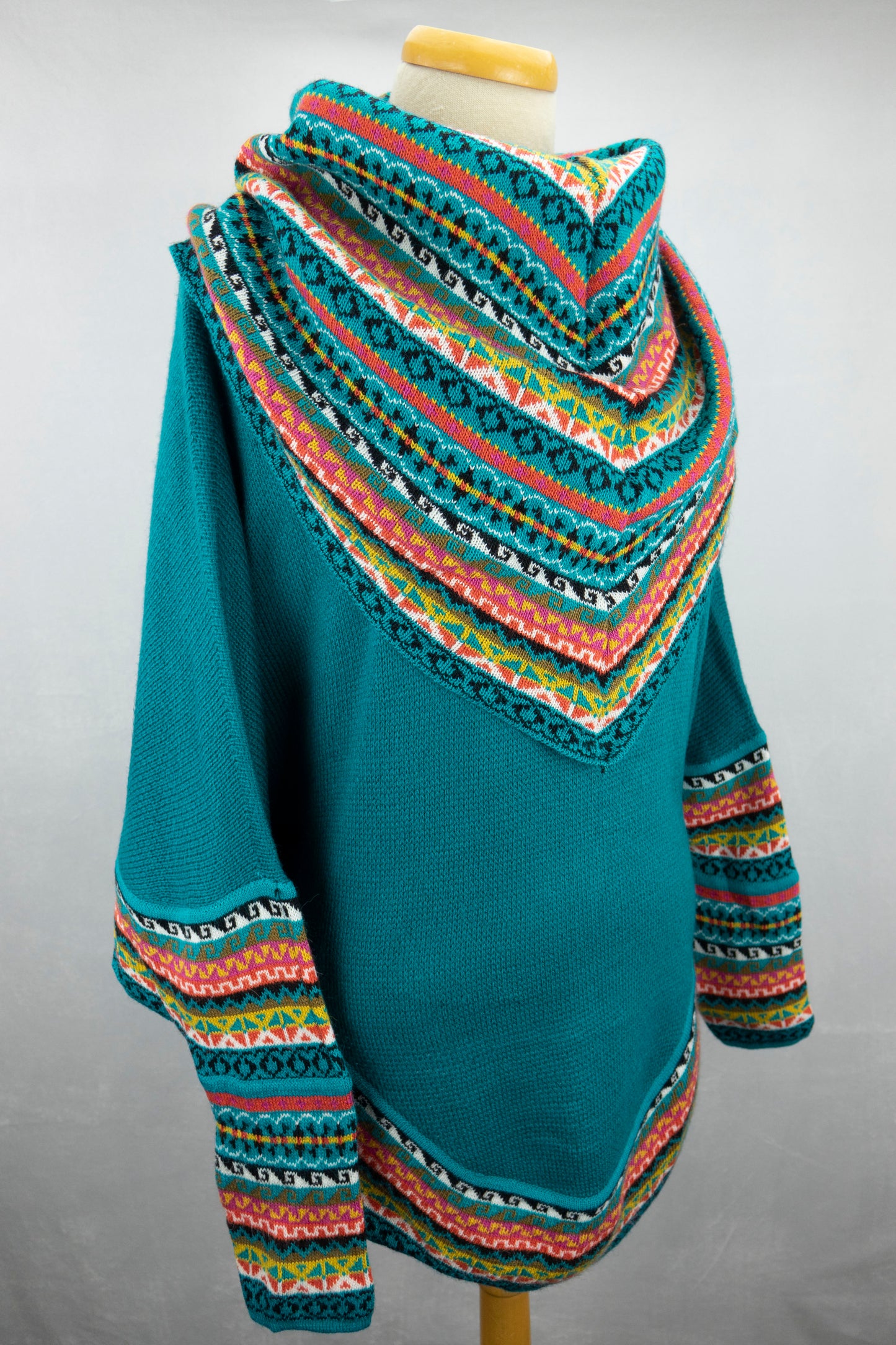 Poncho avec manches et collet Tarjeta