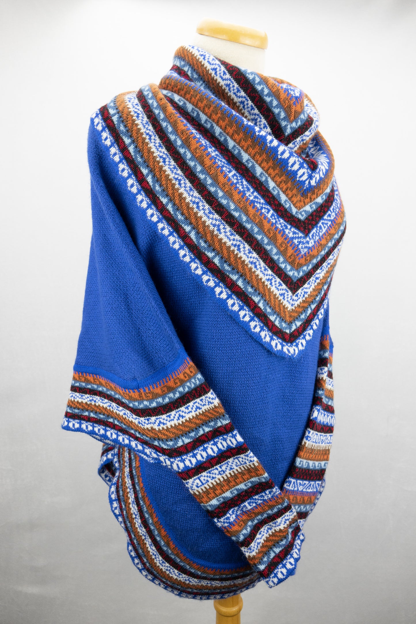 Poncho avec manches et collet Tarjeta