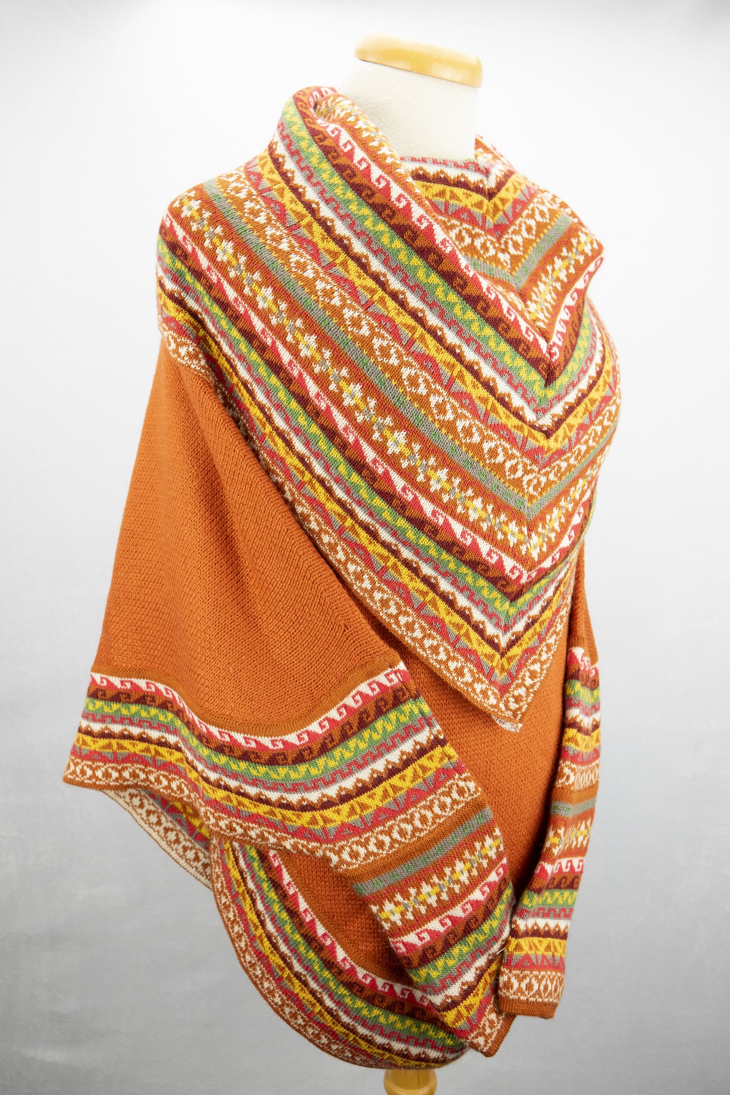 Poncho avec manches et collet Tarjeta