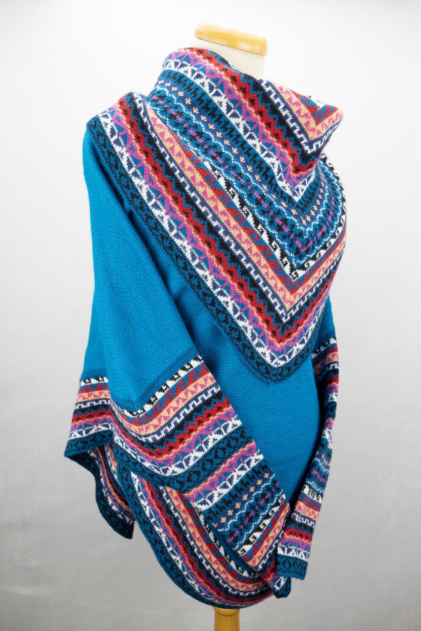 Poncho avec manches et collet Tarjeta