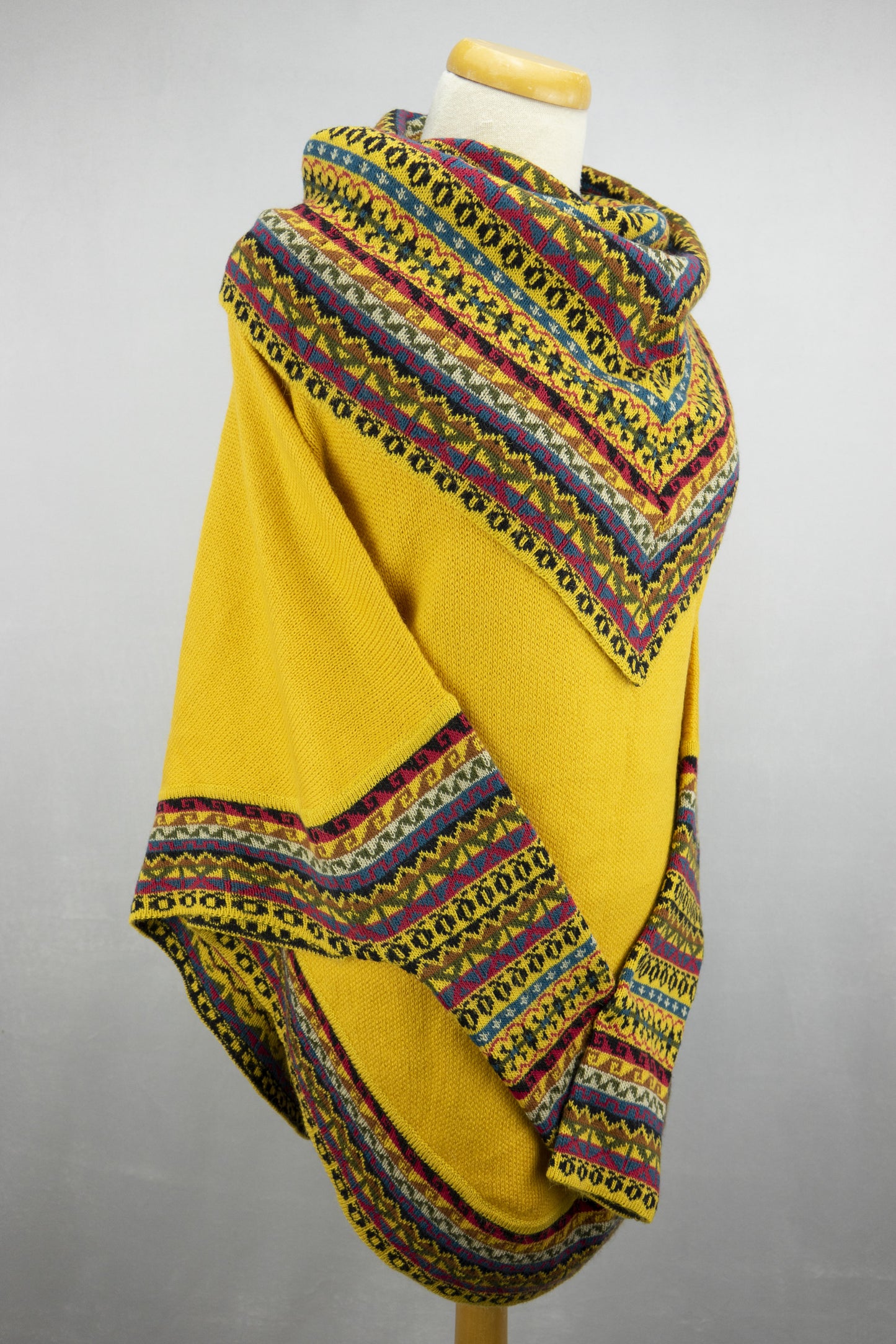 Poncho avec manches et collet Tarjeta