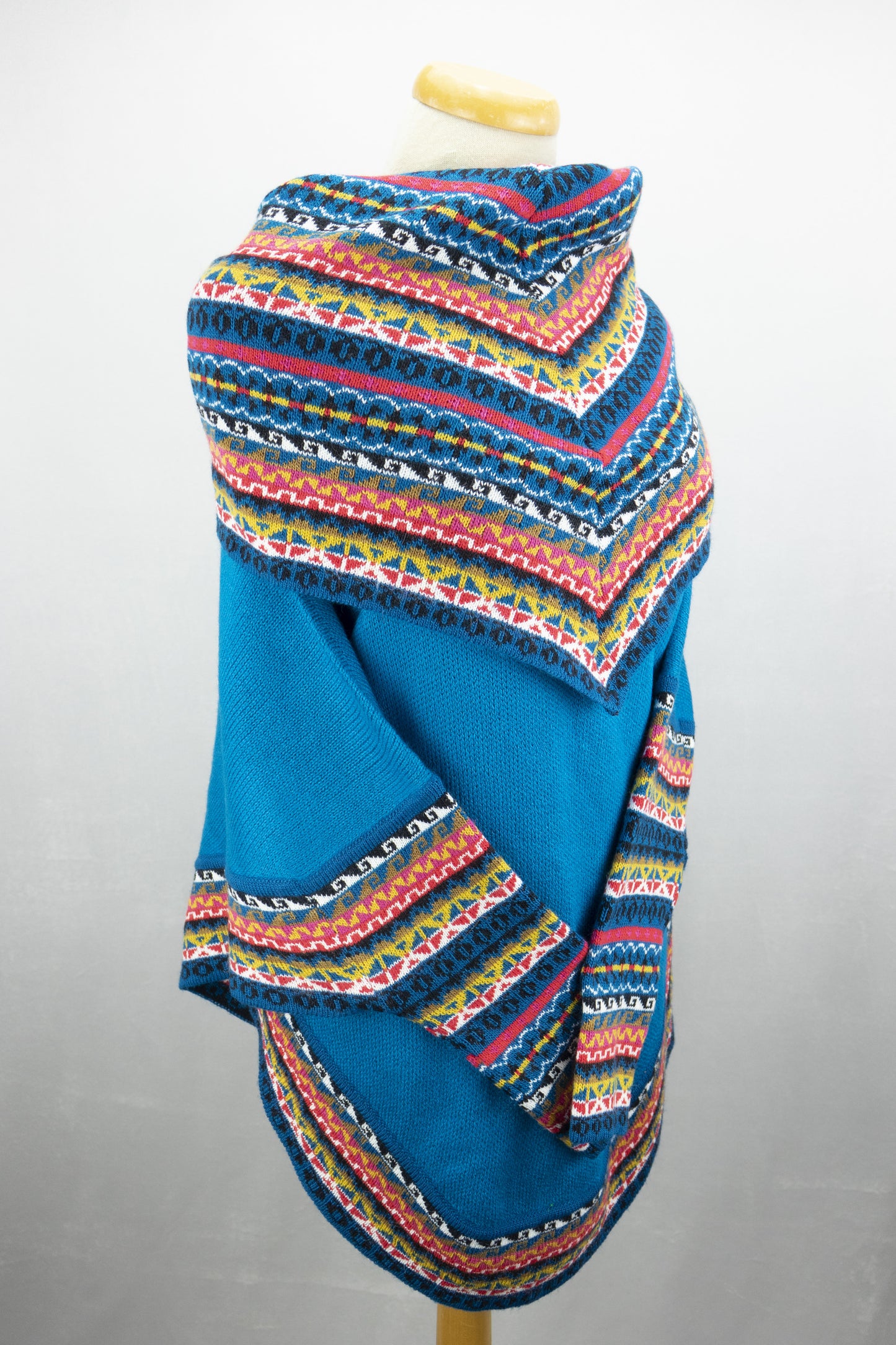 Poncho avec manches et collet Tarjeta