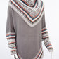 Poncho avec manches et collet Tarjeta
